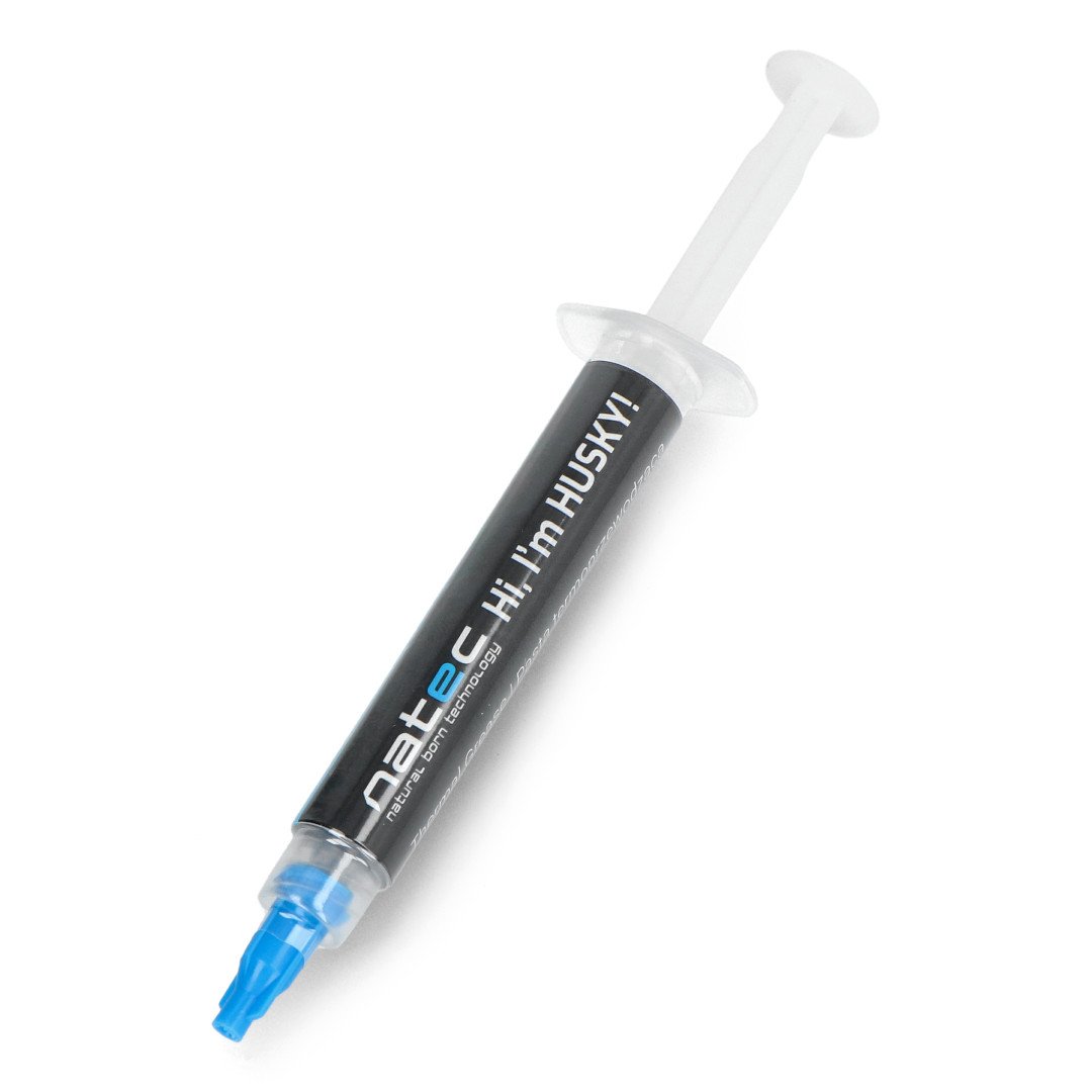 Thermally conductive paste in a syringe.