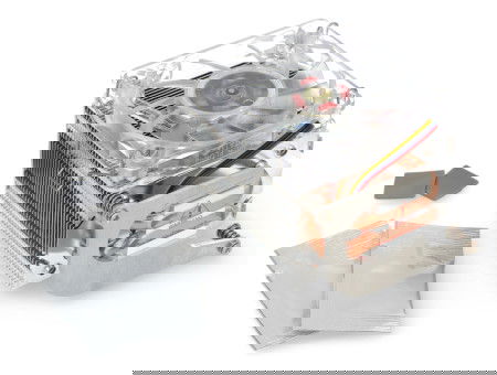 A silver fan with a radiator for the raspberry pi 5 lies on a white background along with the kit elements.