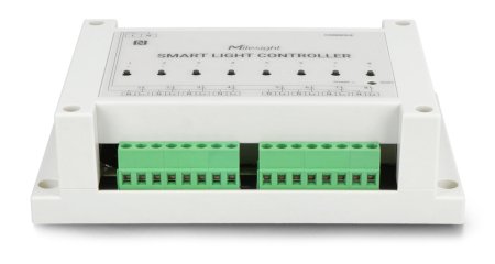 The creamy white Lorawan lighting controller lies on a white background from above.