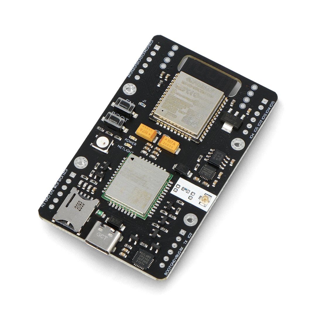 The black Micromis Base V1 development board lies on a white background.