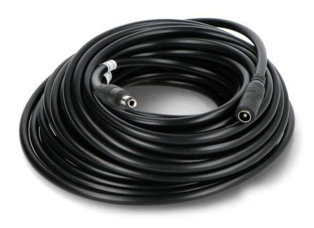 A black and coiled electric wire lies on a white background.