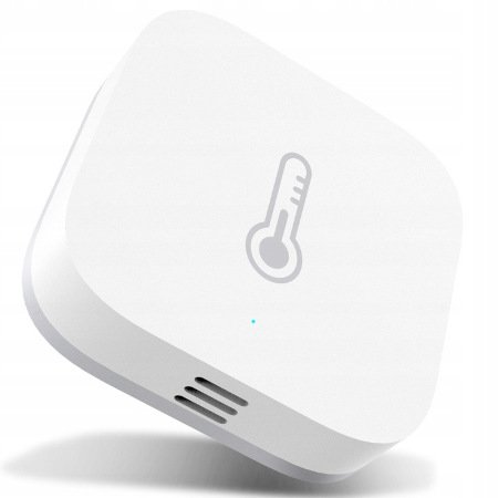 White and smart temperature sensor lies on a white background.
