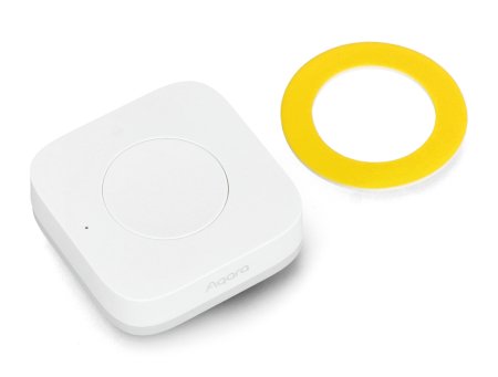 A white Aqara switch lies on a white background with a mounting element.