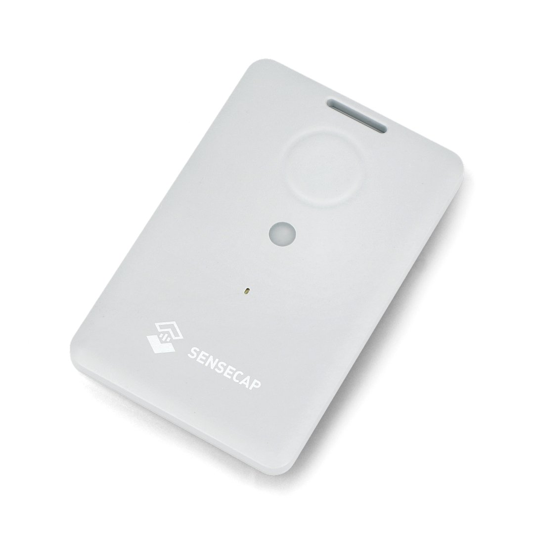 A portable GPS locator in light gray color lies on a white background.